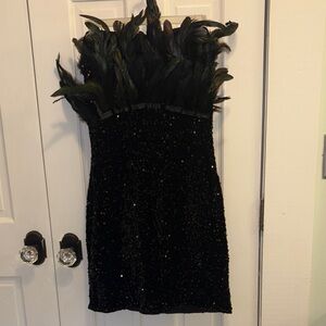 Elegant Black Strapless Dress with Feather Detail